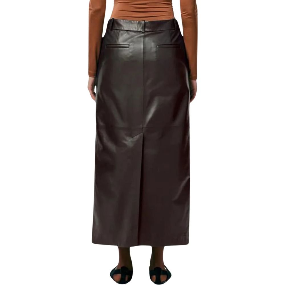 Close-up of brown leather skirt showing texture