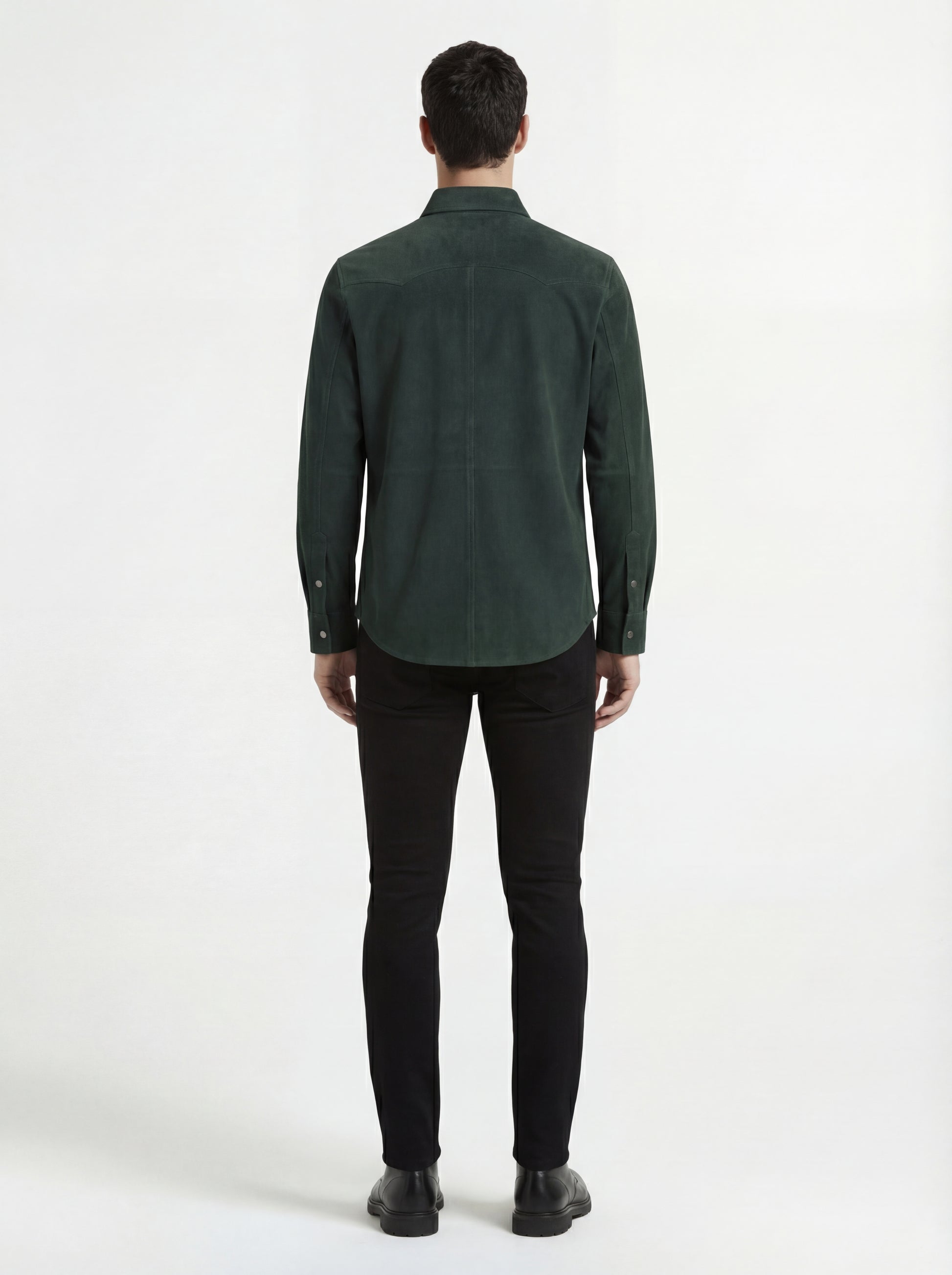 Rear view of male model wearing Maverick Liam suede western shirt showing tailored shoulder fit and western yoke styling. Maverick Jacket.