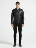 Male model wearing Maverick Spencer leather zip-front shirt, regular fit, styled with black skinny jeans. Maverick Jacket.