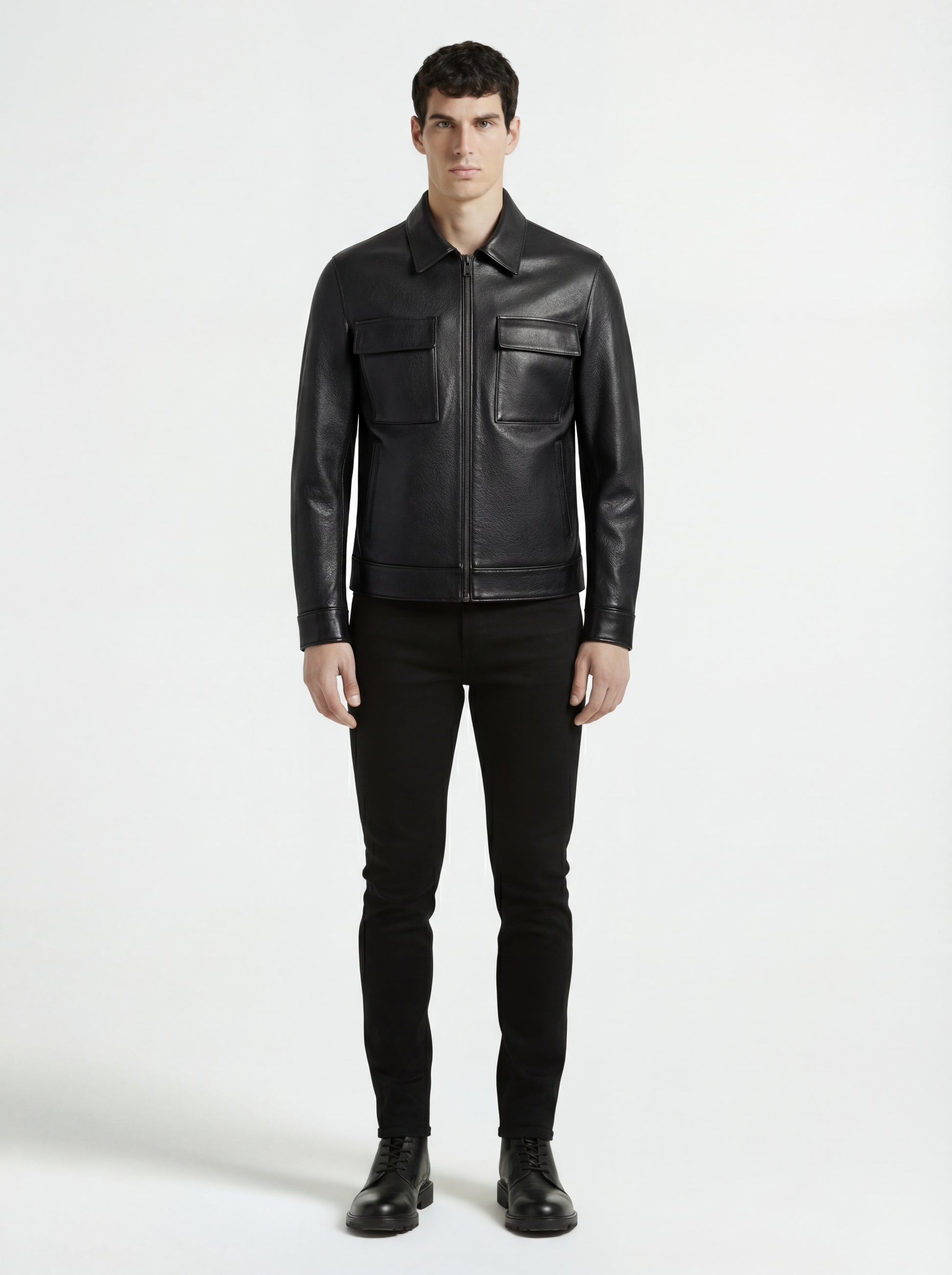 Male model wearing Maverick Spencer leather zip-front shirt, regular fit, styled with black skinny jeans. Maverick Jacket.