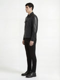 Side profile of Maverick Spencer leather zip-front shirt showing full sleeve structure and clean torso silhouette. Maverick Jacket.