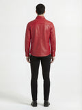 Rear view of male model wearing Maverick Griffin red leather western shirt showing tailored shoulder fit and western yoke styling. Maverick Jacket.