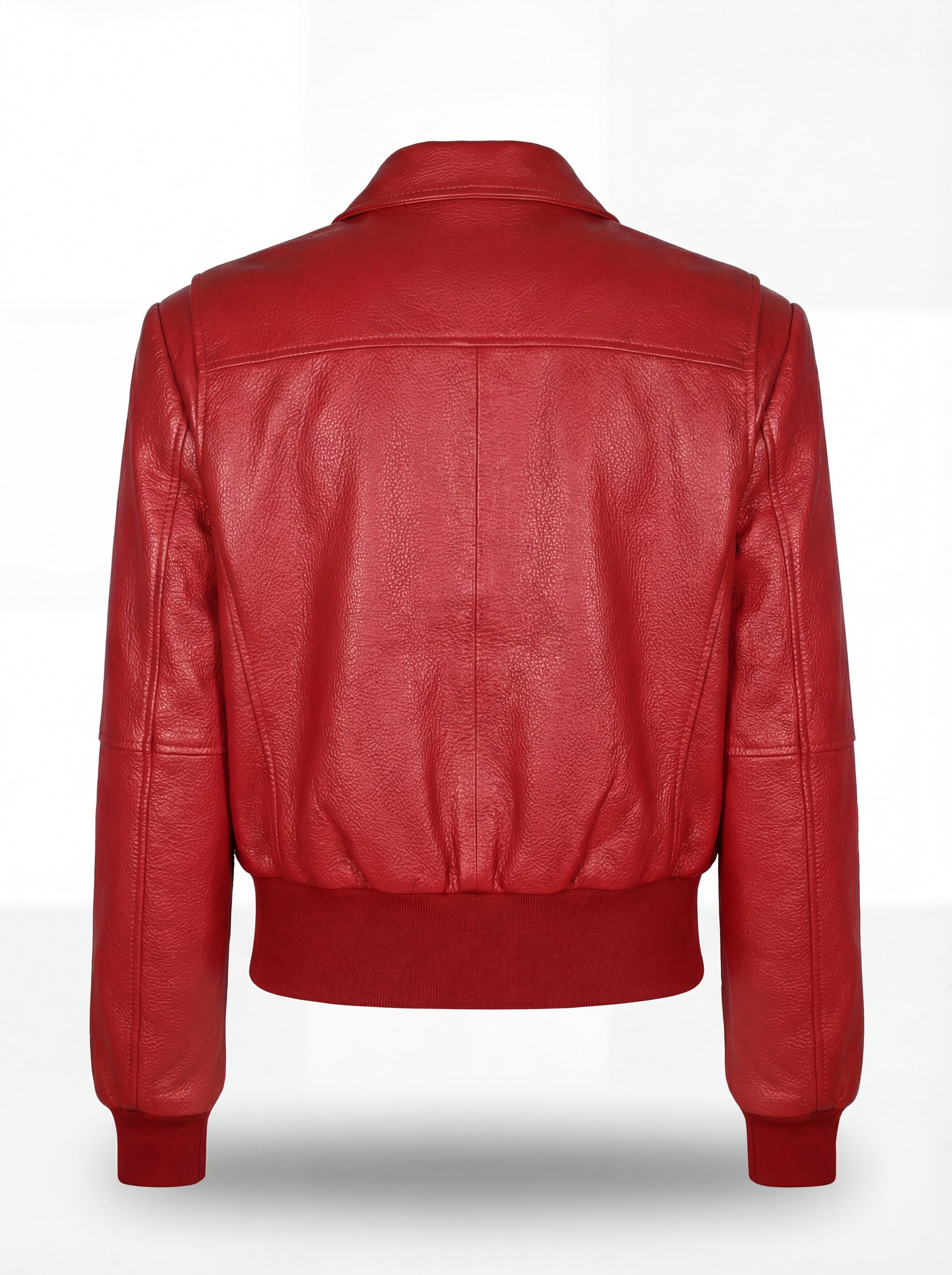 Rear view of red leather bomber jacket showing vertical back seam and elasticated ribbed hem. The Isla by Maverick Jacket.