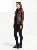 Side profile of Maverick Sienna brown bomber jacket showing ribbed cuffs and fitted bomber silhouette. Maverick Jacket.