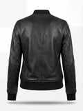 Rear view of black pebbled leather bomber jacket showing vertical back seam and ribbed knit hem. The Roxy by Maverick Jacket.