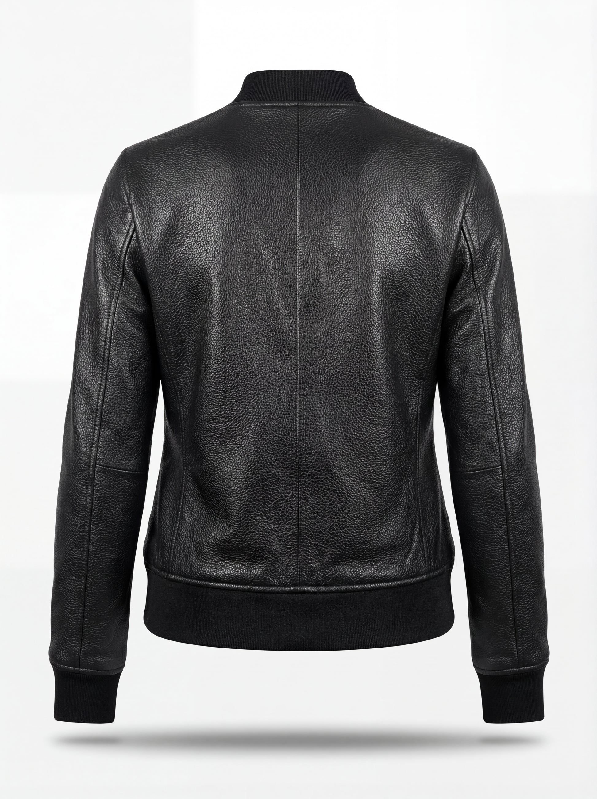 Rear view of black pebbled leather bomber jacket showing vertical back seam and ribbed knit hem. The Roxy by Maverick Jacket.