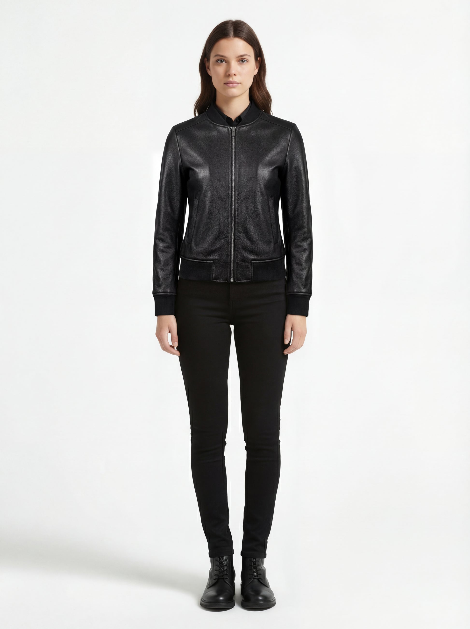 Female model wearing Maverick Roxy pebbled leather bomber, slim fit, styled with black skinny jeans and black leather boots. Maverick Jacket.