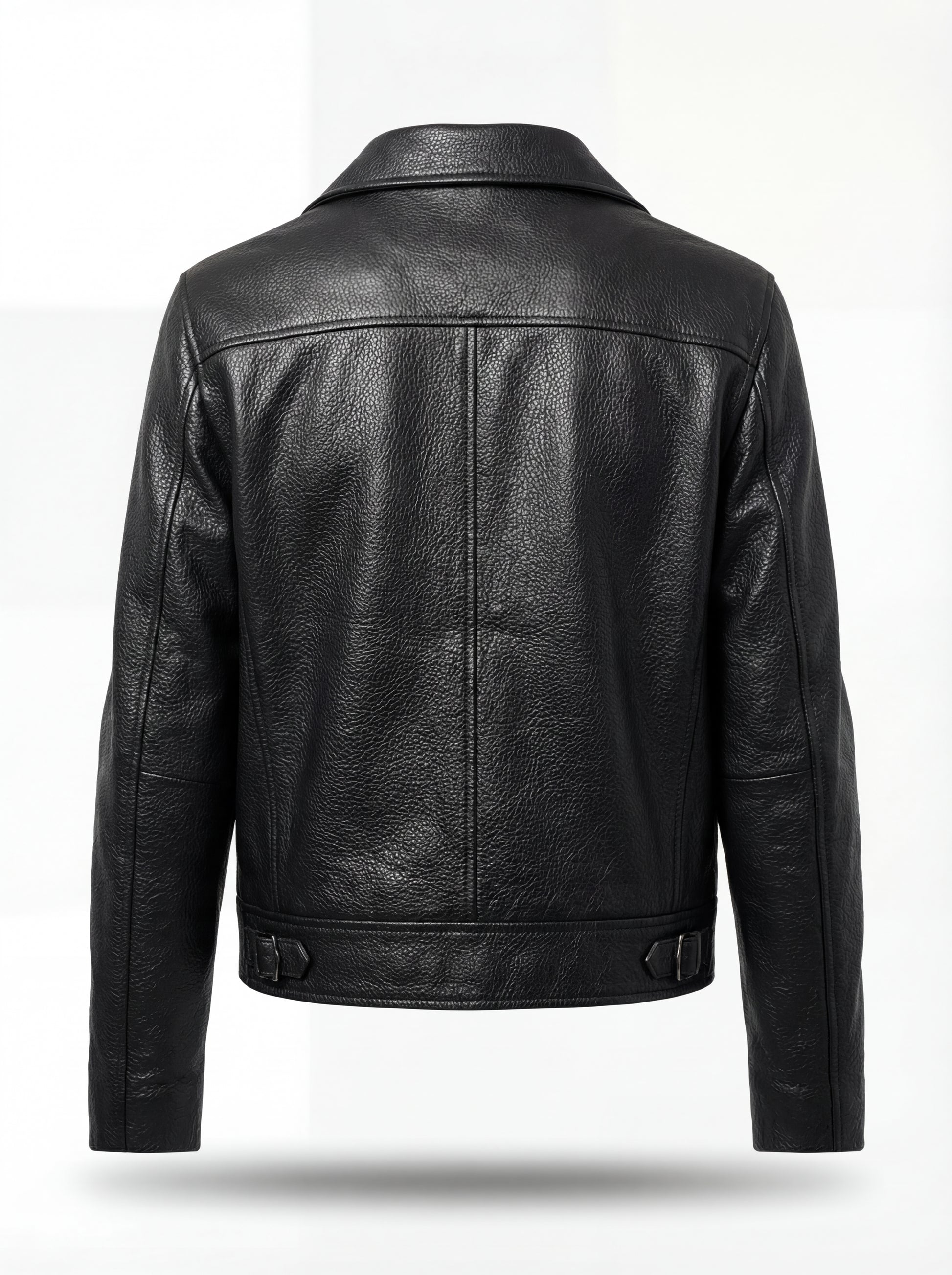 Rear view of black leather trucker jacket showing central vertical seam and adjustable side waist tabs. The Matrix by Maverick Jacket.