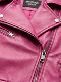 Macro shot of grained fuchsia leather texture and silver zipper lapel detail on biker jacket. The Cleo by Maverick Jacket.