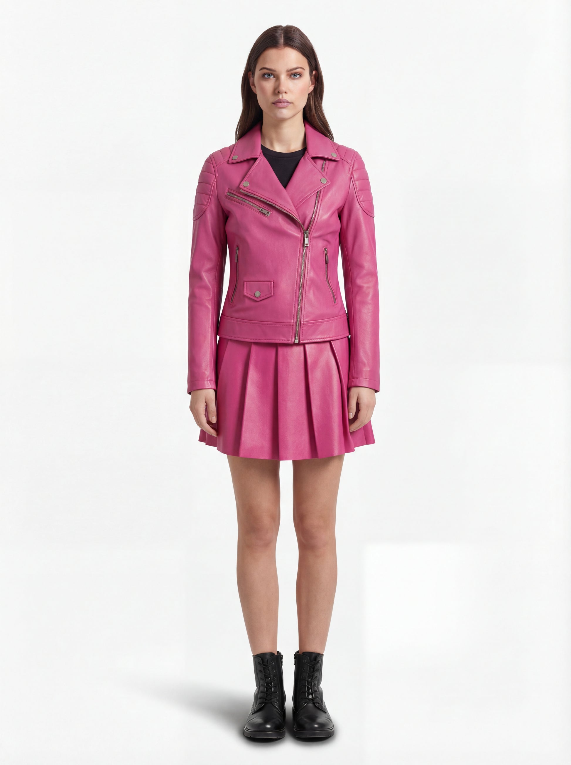 Female model wearing Maverick Cleo leather biker jacket, slim fit, styled with Maverick Poppy fuchsia pleated leather skirt. Maverick Jacket.
