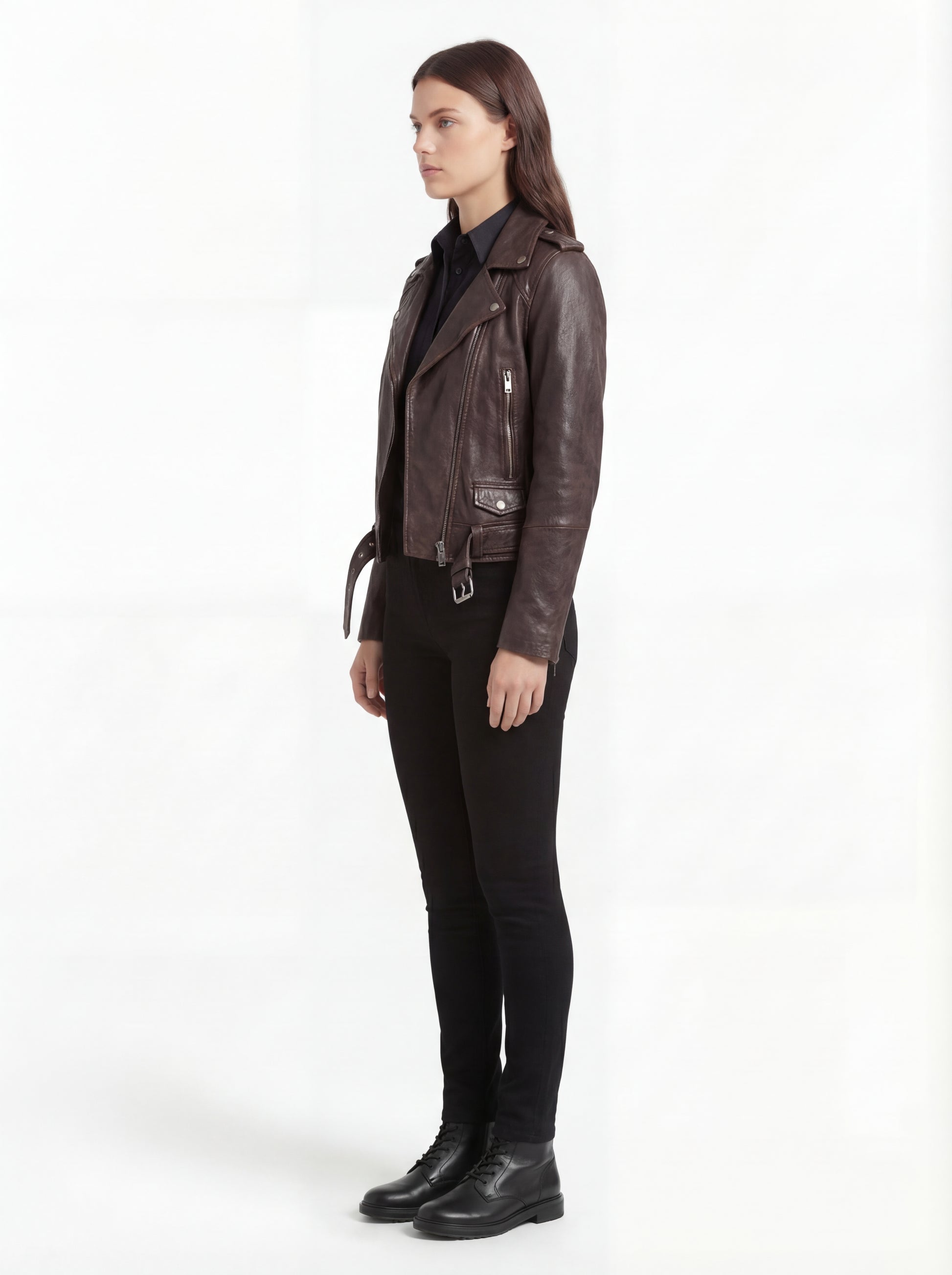Side profile of Maverick Zephyr distressed brown biker jacket showing zippered sleeve cuffs and belted hem detail. Maverick Jacket.