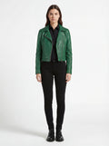 Female model wearing Maverick Jade emerald green biker jacket, slim fit, styled with black button-down shirt and black skinny jeans. Maverick Jacket.