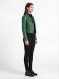 Side profile of Maverick Jade emerald green biker jacket showing zippered sleeve cuffs and fitted silhouette. Maverick Jacket.