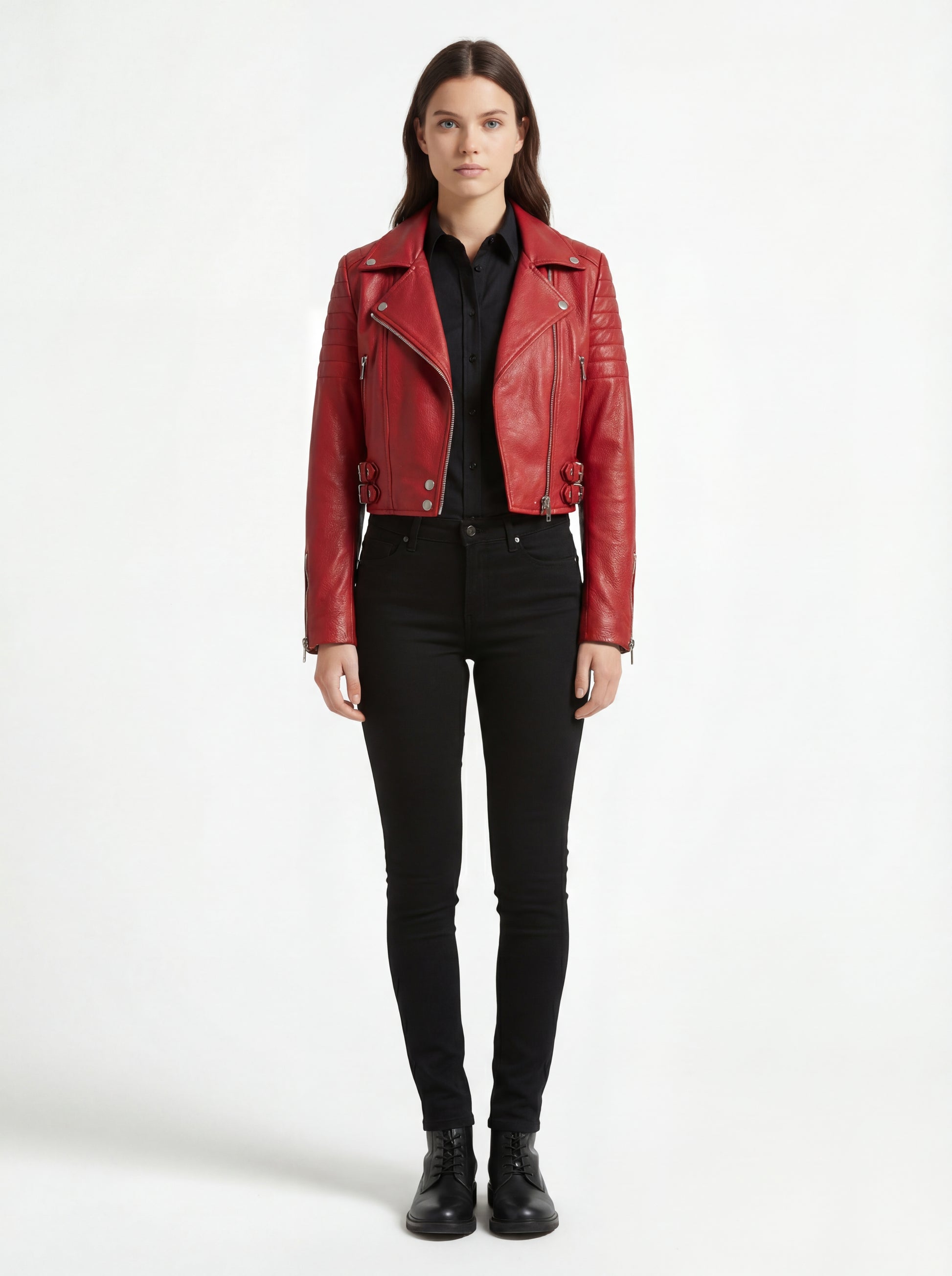 Female model wearing Maverick Vixen red biker jacket, cropped fit, styled with black button-down shirt and black skinny jeans. Maverick Jacket.