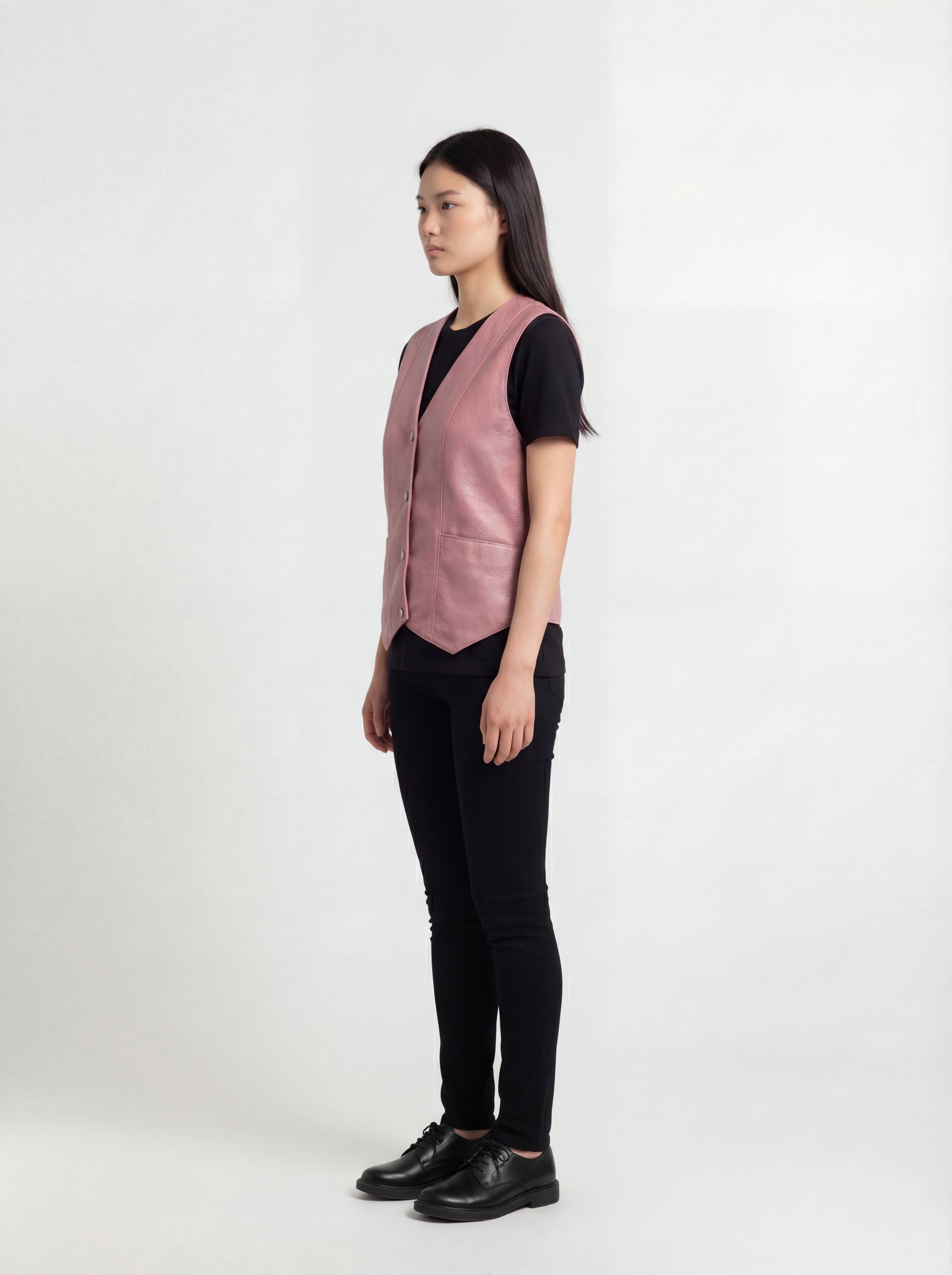 Side profile of Maverick Belle vest showing sleeveless armhole cut and slim torso silhouette. Maverick Jacket.