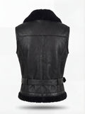 Rear view of black leather shearling vest showing vertical seam paneling and fur-lined hem. The Aves by Maverick Jacket.