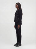 Side profile of Maverick Eclipse suede jacket showing zippered sleeve cuffs and slim cropped silhouette. Maverick Jacket.