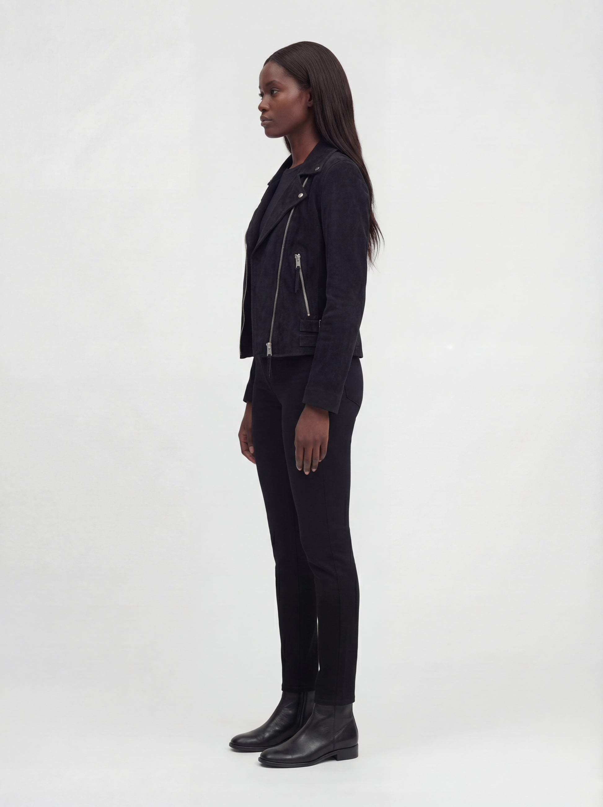 Side profile of Maverick Eclipse suede jacket showing zippered sleeve cuffs and slim cropped silhouette. Maverick Jacket.