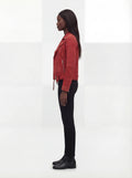 Side profile of Maverick Ember suede jacket showing zippered sleeve cuffs and slim cropped silhouette. Maverick Jacket.