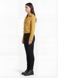 Side profile of Maverick Citrine suede jacket showing zippered cuff details and slim cropped silhouette. Maverick Jacket.