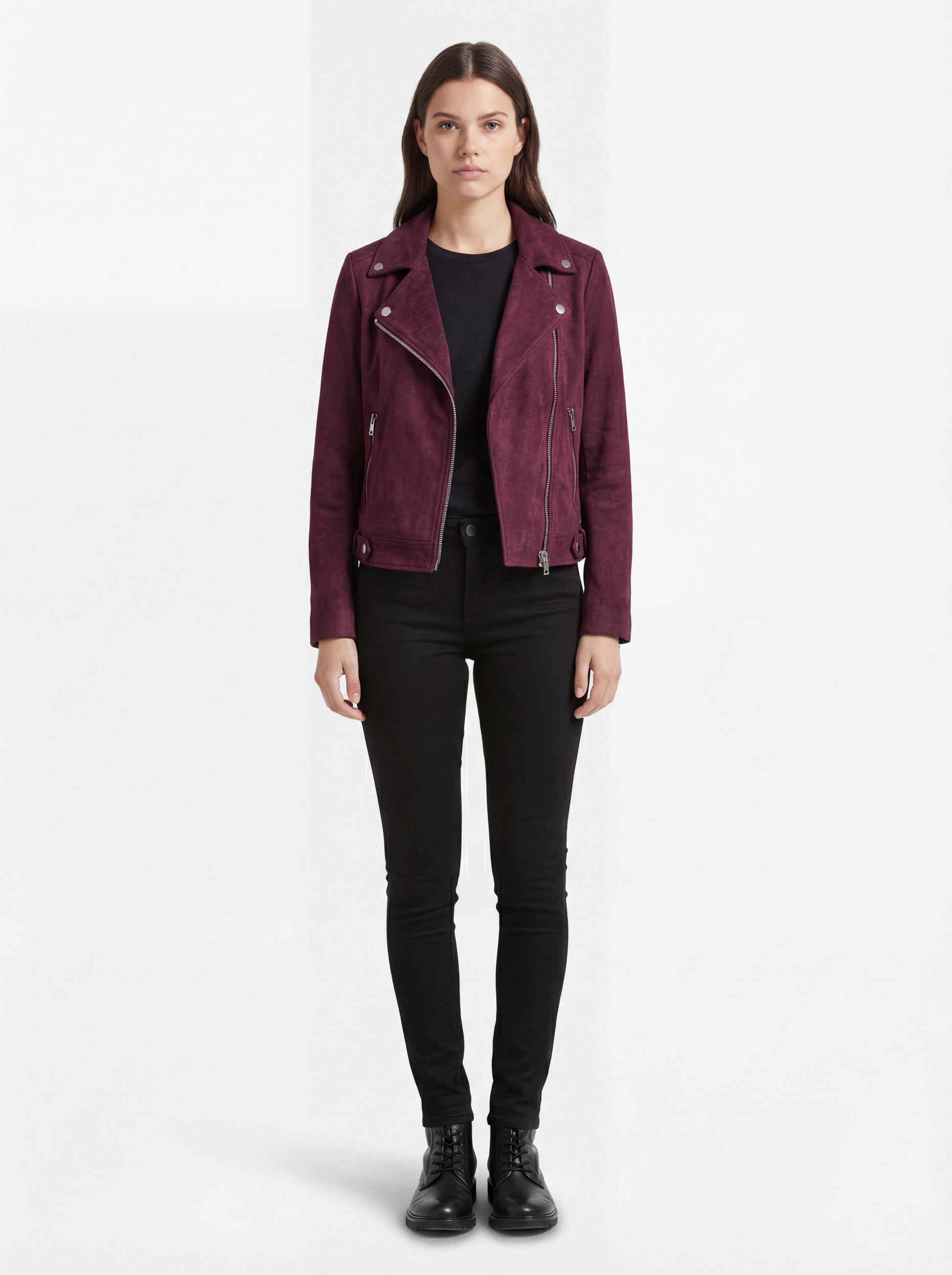 Female model wearing Maverick Amethyst suede biker jacket, slim fit, styled with black skinny jeans and leather ankle boots. Maverick Jacket.