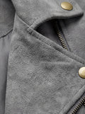Macro shot of soft grey suede texture and gold snap button hardware on biker jacket. Maverick Jacket Maverick Luna.