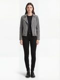 Female model wearing Maverick Luna suede biker jacket, slim fit, styled with black skinny jeans and lace-up boots. Maverick Jacket.