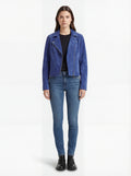 Female model wearing Maverick Sapphire suede biker jacket, slim fit, styled with black skinny jeans and leather ankle boots. Maverick Jacket.