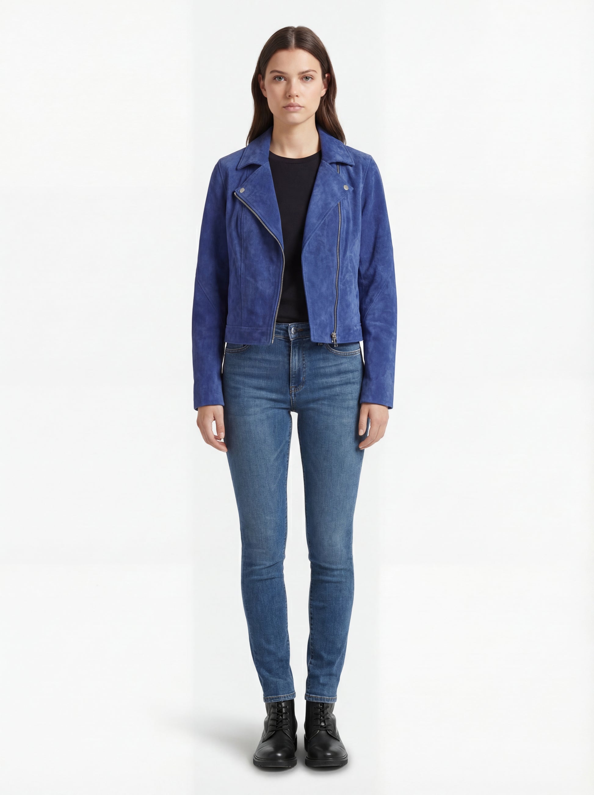 Female model wearing Maverick Sapphire suede biker jacket, slim fit, styled with black skinny jeans and leather ankle boots. Maverick Jacket.