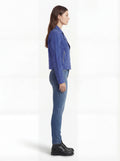 Side profile of Maverick Sapphire suede biker jacket showing zippered sleeve cuffs and cropped silhouette. Maverick Jacket.