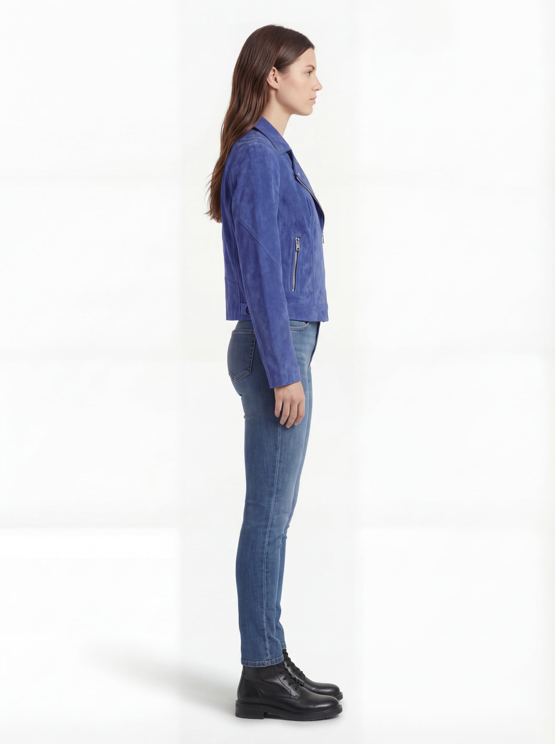 Side profile of Maverick Sapphire suede biker jacket showing zippered sleeve cuffs and cropped silhouette. Maverick Jacket.