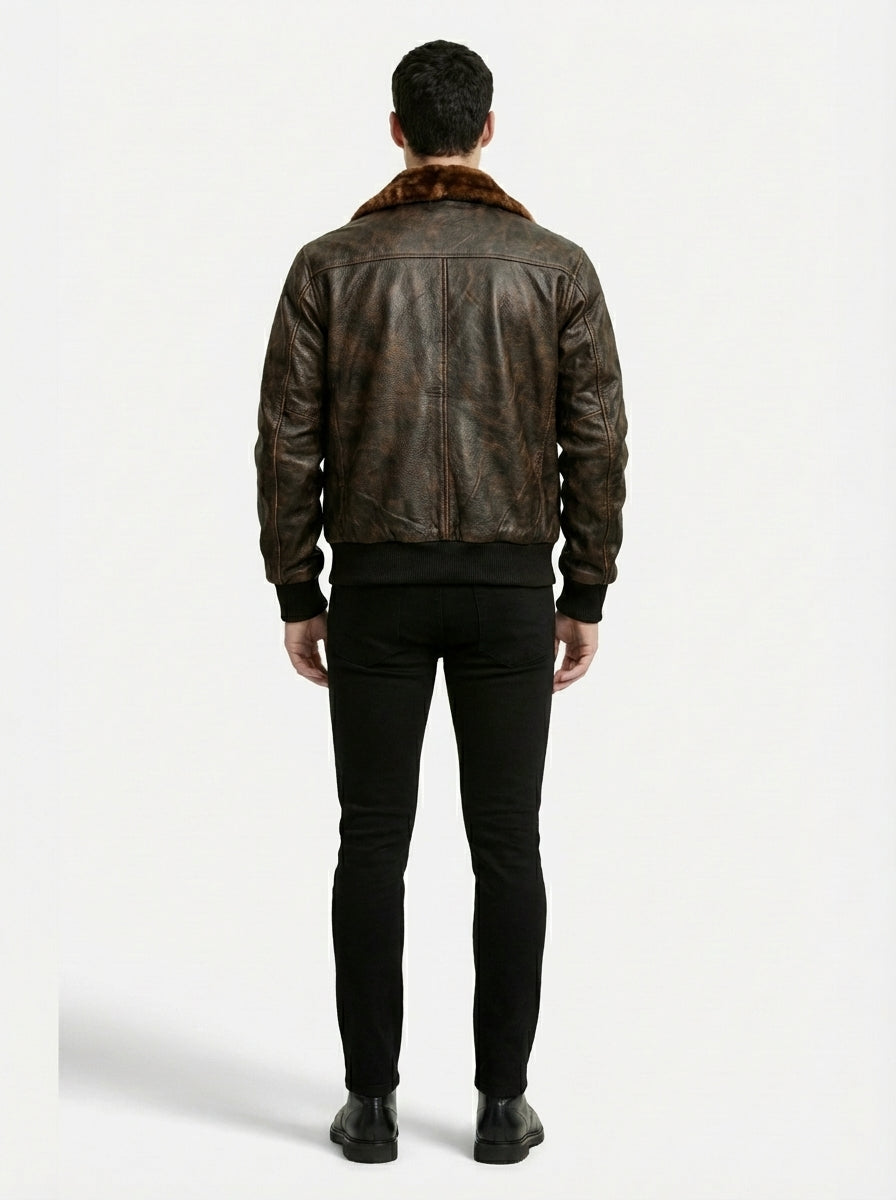 Rear view of male model wearing Maverick Corsair aviator jacket showing broad shoulder fit and ribbed hem styling. Maverick Jacket.