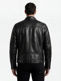 Rear view of male model wearing Maverick Zenith leather cafe racer showing fitted shoulder silhouette and straight hem styling. Maverick Jacket.