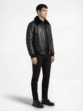 Side profile of Maverick Phantom Black Leather Flight Jacket showing zippered sleeve pocket and aviator silhouette. Maverick Jacket.