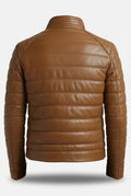 Rear view of light brown padded leather jacket showing continuous horizontal quilting pattern and shoulder yoke. The Terrano by Maverick Jacket.