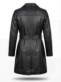 Rear view of black leather trench coat showing horizontal yoke seam and center hem vent. Maverick Kensington.