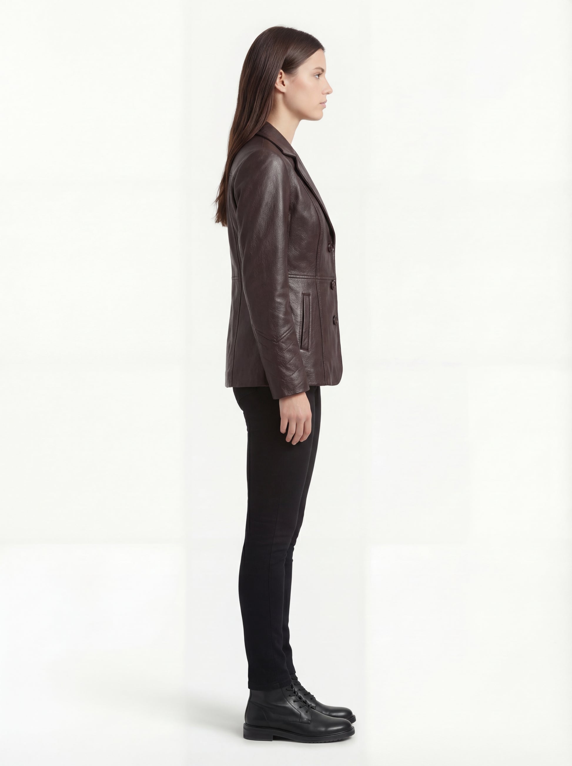 Side profile of Maverick Belgravia trench coat showing set-in sleeves and hip-length silhouette. Maverick Belgravia.