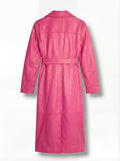Rear view of pink leather trench coat showing structured storm flap yoke and vented hem. The Eira is Maverick Jacket.