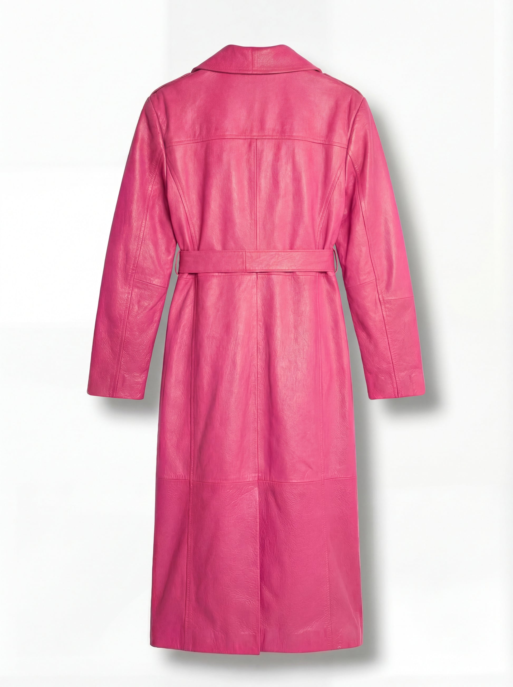 Rear view of pink leather trench coat showing structured storm flap yoke and vented hem. The Eira is Maverick Jacket.