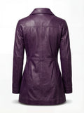 Rear view of purple leather walker coat showing T-shaped yoke seam and vertical paneling. Maverick Helena.
