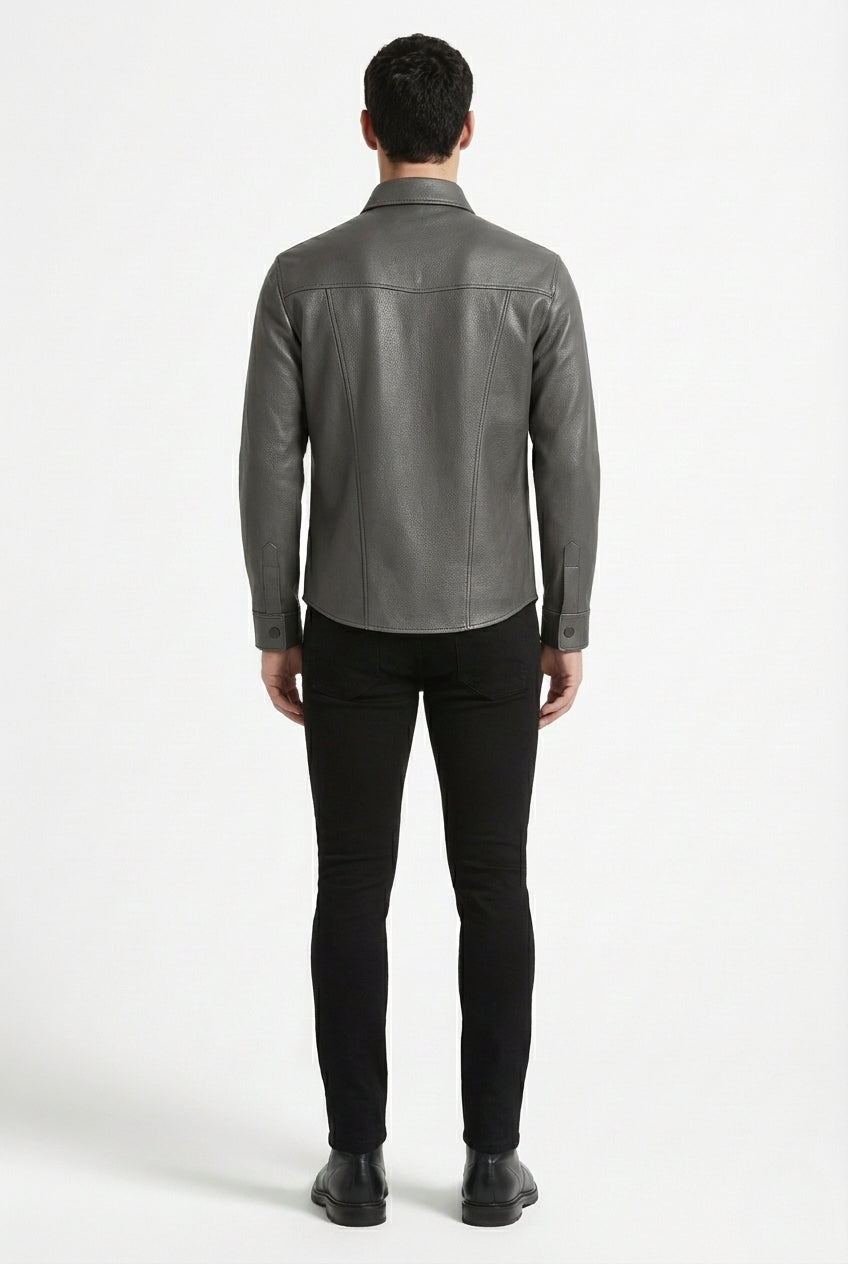 Rear view of male model wearing Maverick Grayson leather western shirt showing tailored shoulder fit and western yoke styling. Maverick Jacket.