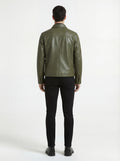 Rear view of male model wearing Maverick Killian leather zip shirt showing tailored shoulder fit and straight hem styling. Maverick Jacket.