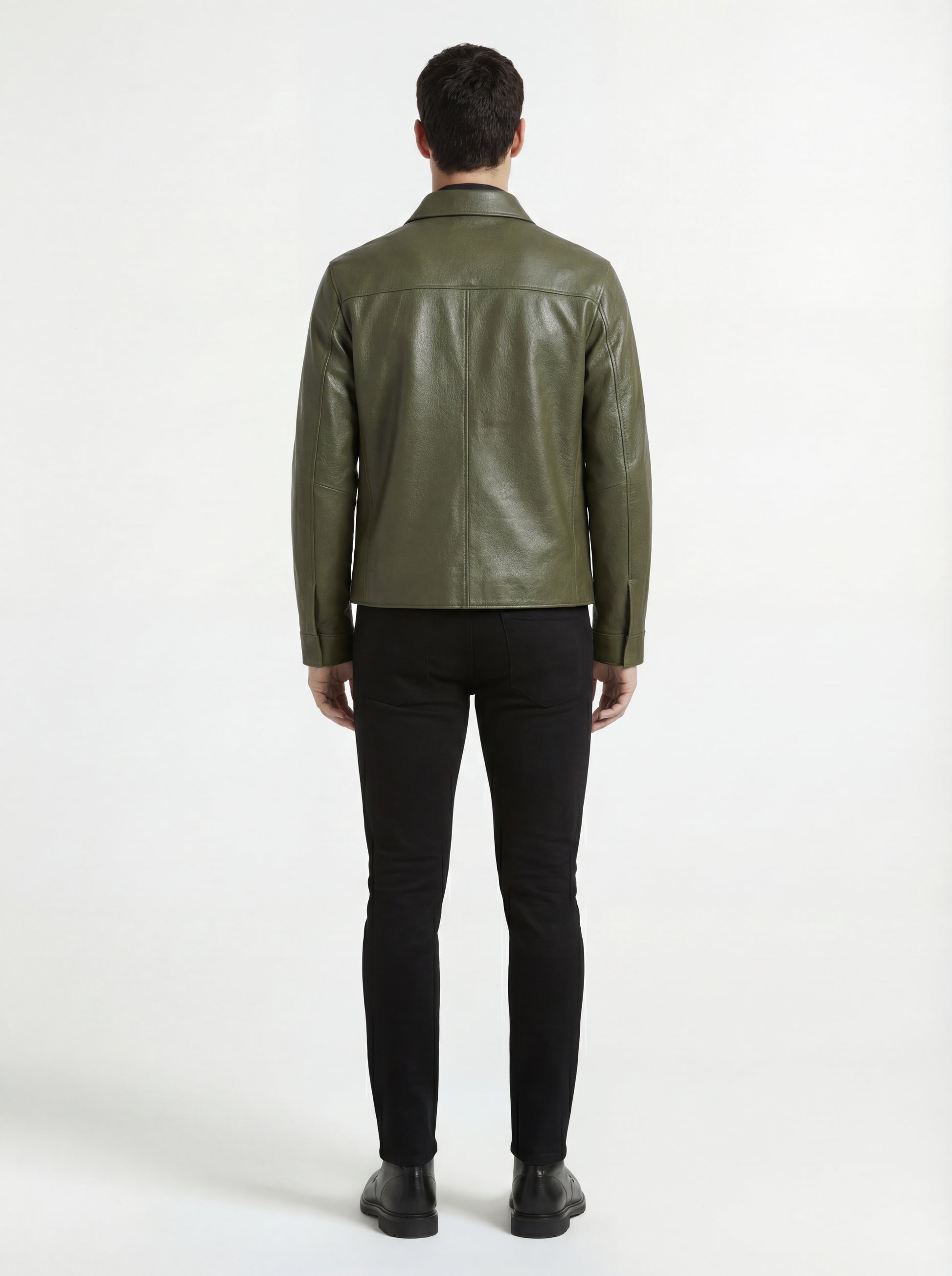 Rear view of male model wearing Maverick Killian leather zip shirt showing tailored shoulder fit and straight hem styling. Maverick Jacket.