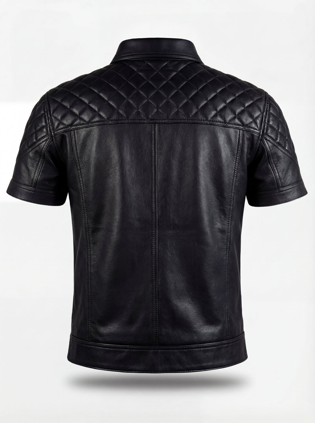 Men's black leather short-sleeve shirt with diamond quilted shoulder panels and chest flap pockets, Front View. The Mason by Maverick Jacket.