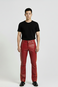 Male model wearing Maverick Jagger two-tone leather racing pants, slim fit, styled with black crewneck t-shirt. Maverick Jacket.