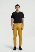 Male model wearing Maverick Huxley leather trousers, slim fit, styled with black crewneck t-shirt. Maverick Jacket.
