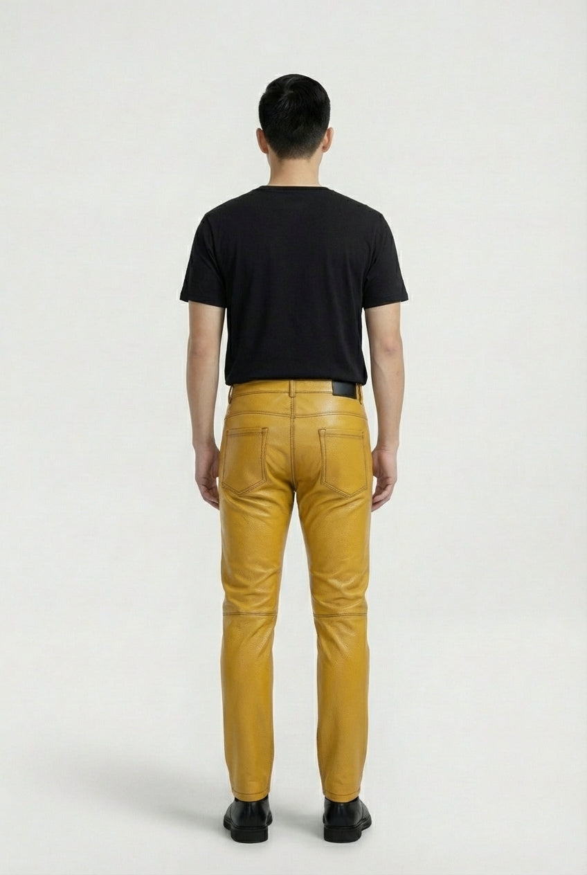 Rear view of male model wearing Maverick Huxley leather trousers showing tailored seat fit and straight leg structure. Maverick Jacket.