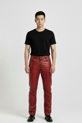 Male model wearing Maverick Knox red leather pants, straight fit, styled with black crew neck t-shirt and black leather boots. Maverick Jacket.
