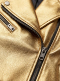 Macro shot of metallic gold leather texture and silver zipper lapel detail on biker jacket. The Aurora by Maverick Jacket.