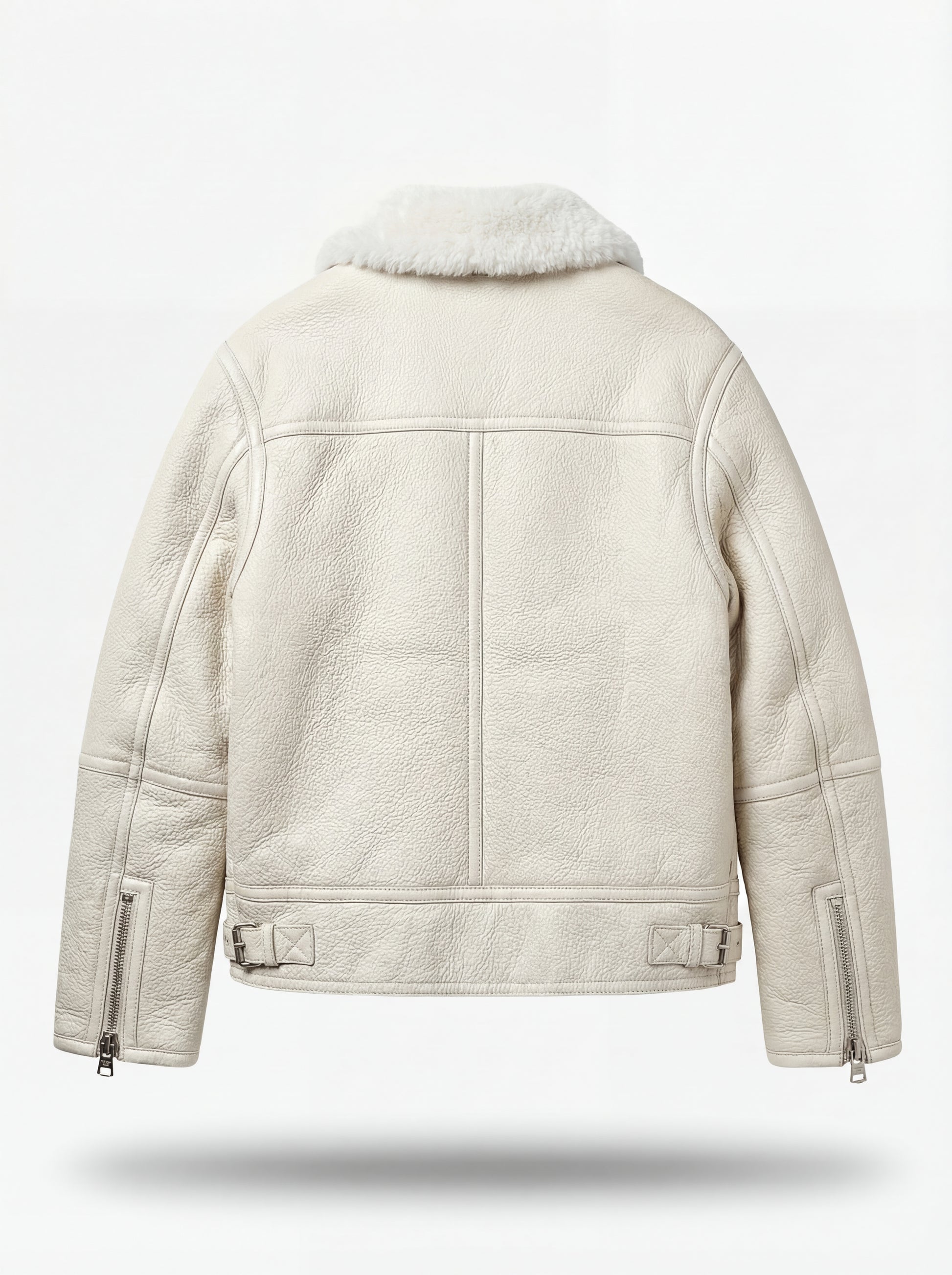 Rear view of white pebbled leather shearling jacket showing vertical center seam and adjustable side waist buckles. The Summit by Maverick Jacket.